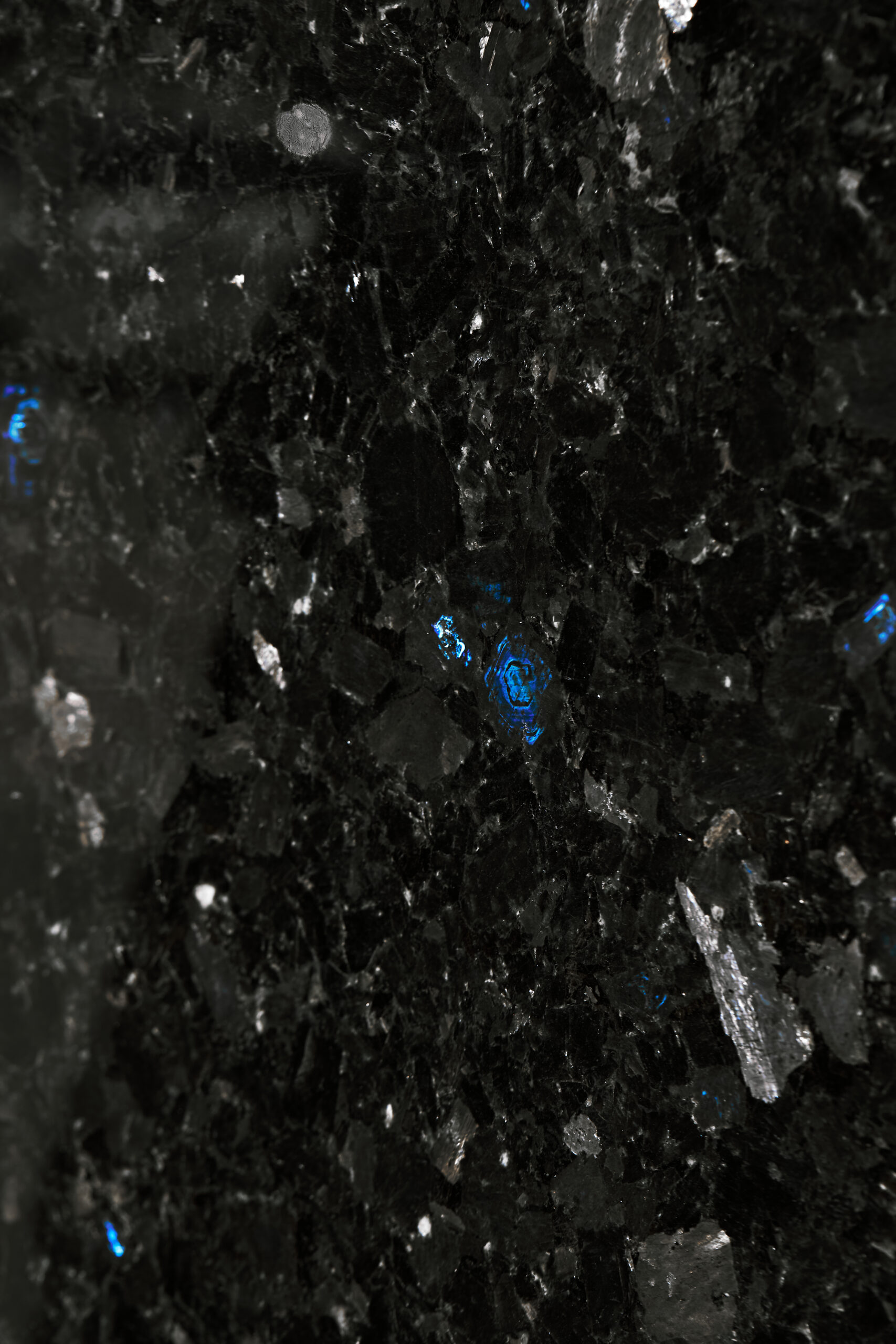 Natural Volga Blue labradorite – dark graphite texture with natural blue iridescence