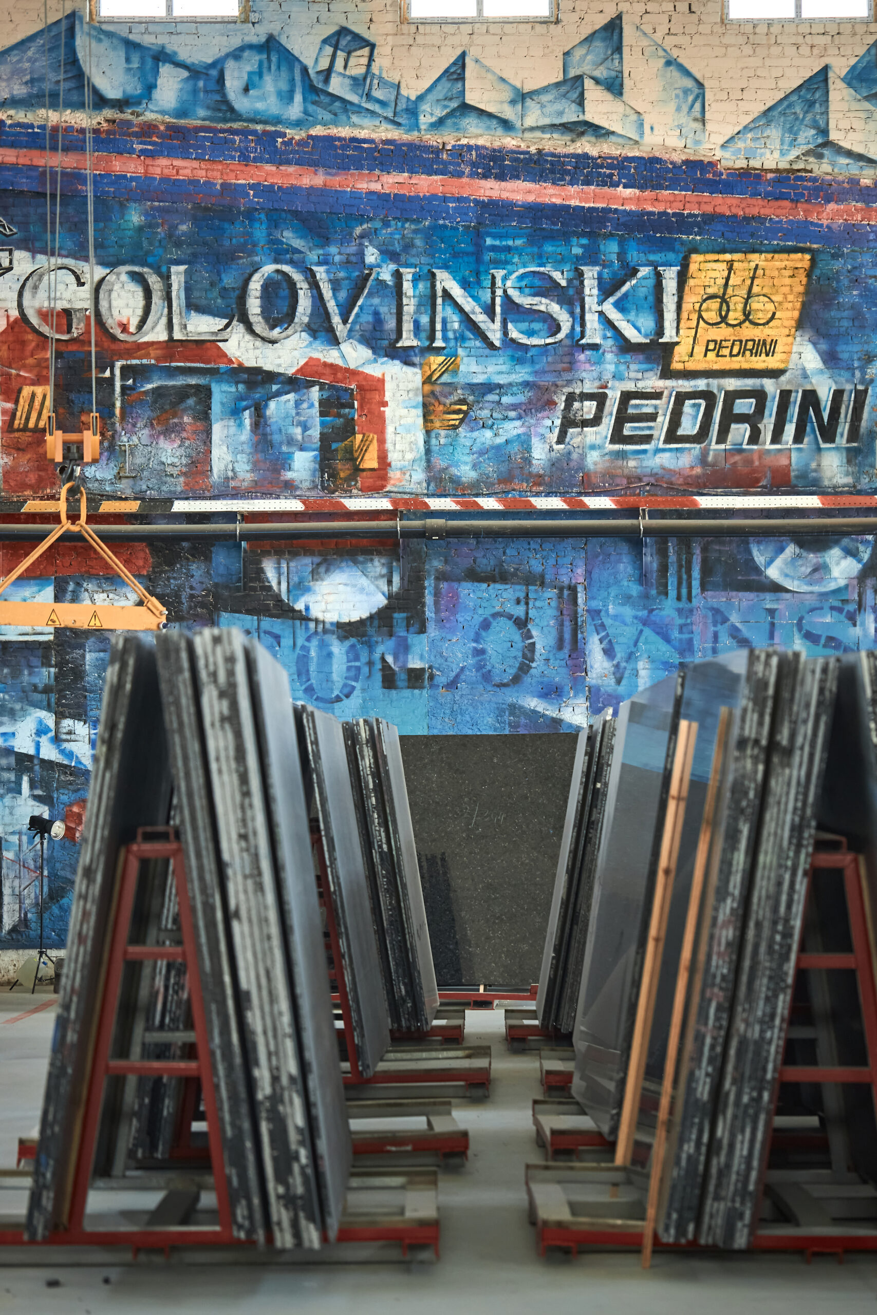 Volga Blue labradorite slabs at the production facility — premium natural stone