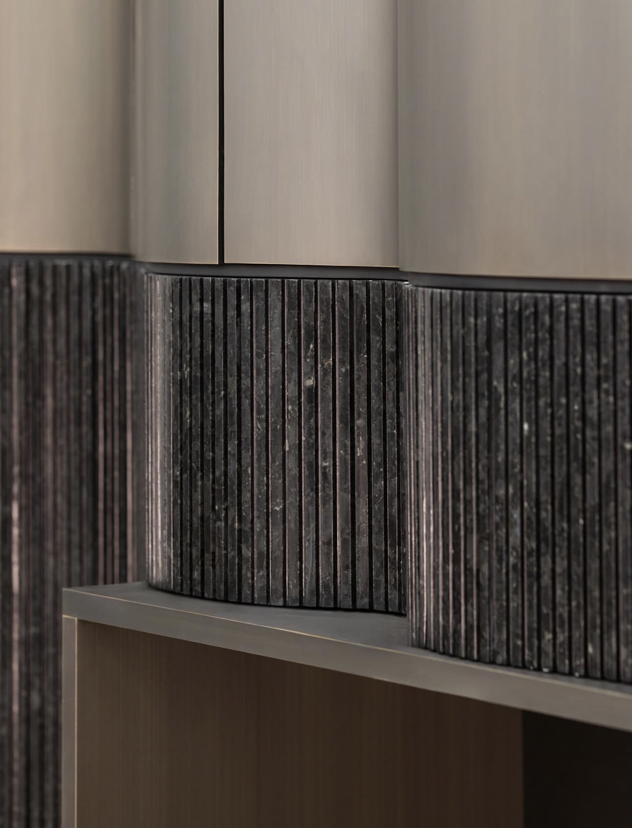 Volga Blue labradorite wall panels in a modern interior near fireplace zone