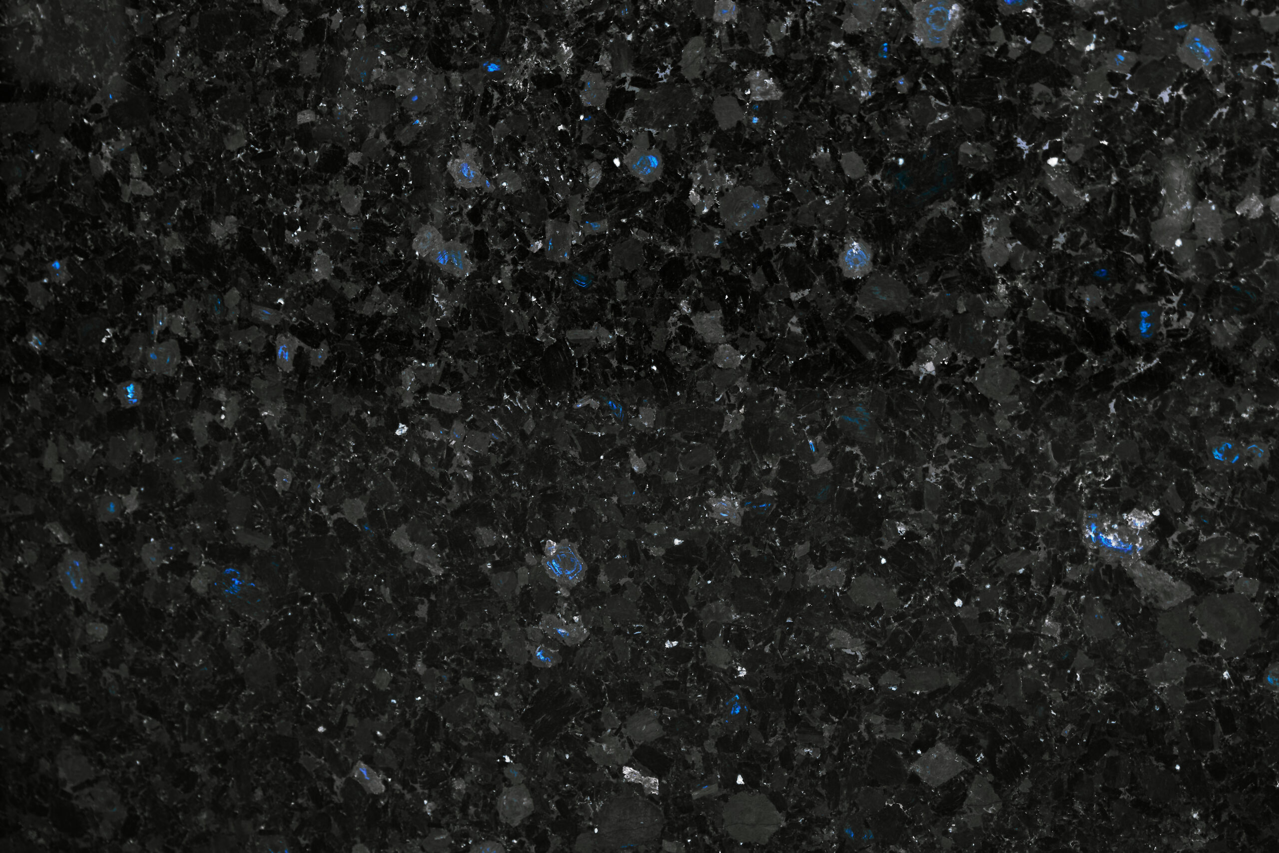 Golovinski labradorite slab with deep graphite grey base and natural blue iridescence