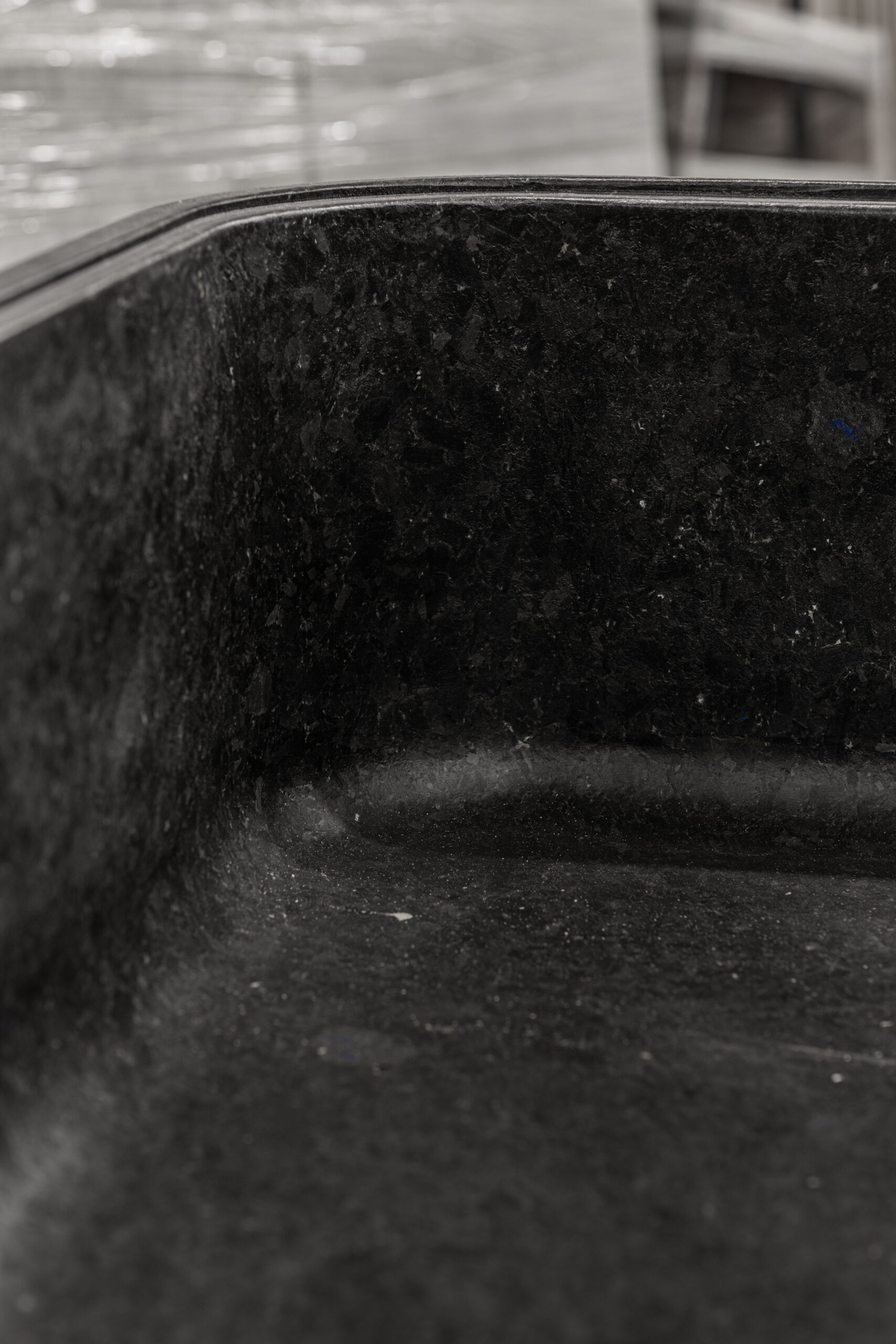 Close-up of the inner part of a monolithic labradorite bathtub