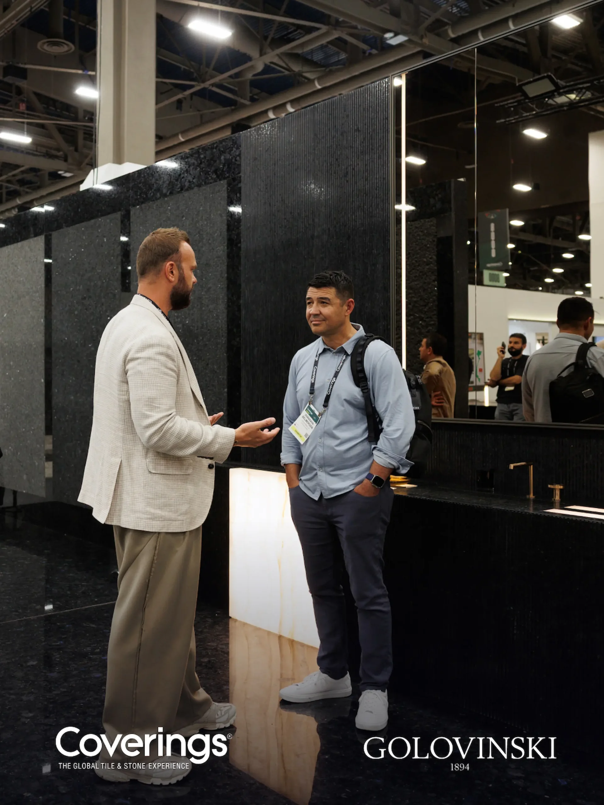 Professional conversation at the Golovinski booth at Coverings 2026
