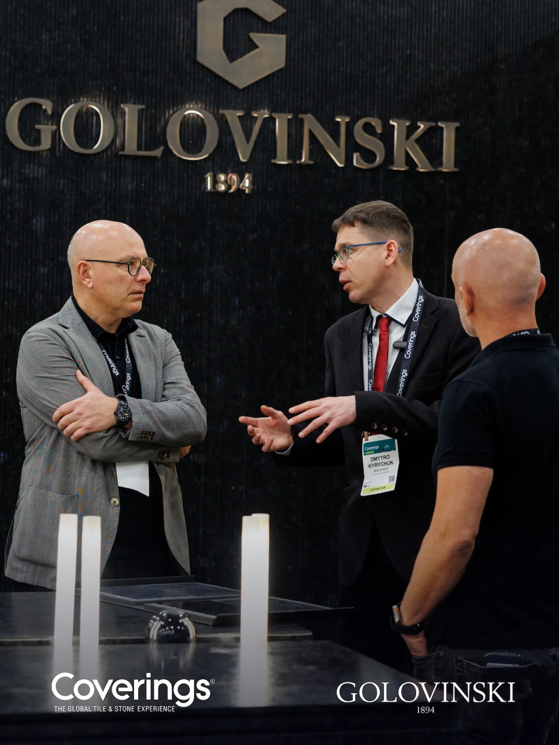 Professional conversation at the Golovinski booth during Coverings 2026